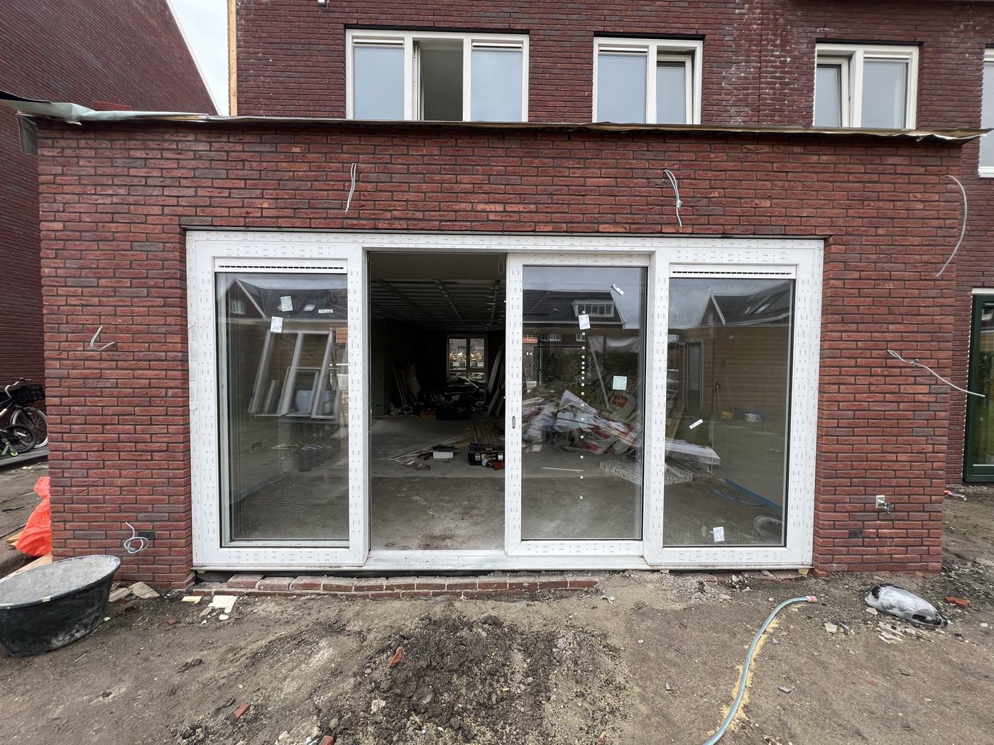 Uitbouw met schuifpui in Assendelft
